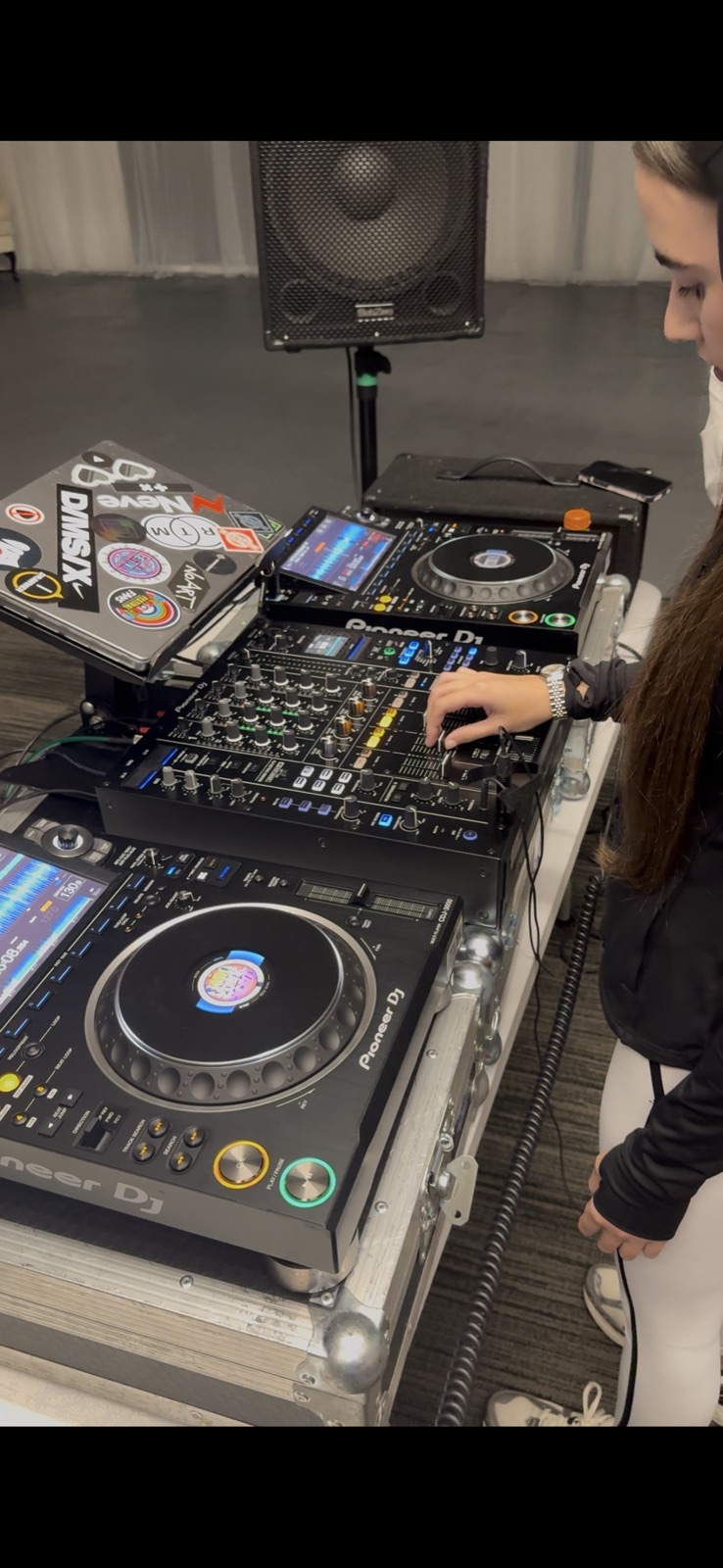 Participants learning to DJ
