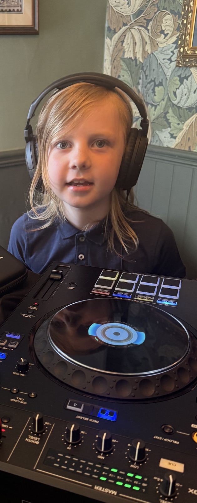 Young person learning to DJ